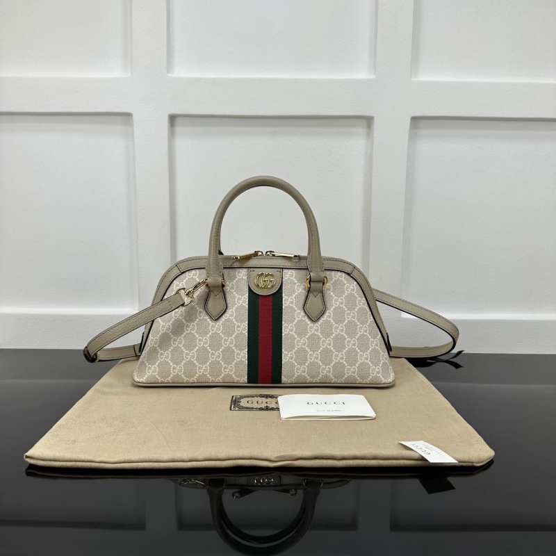 G*u*i top handle bags